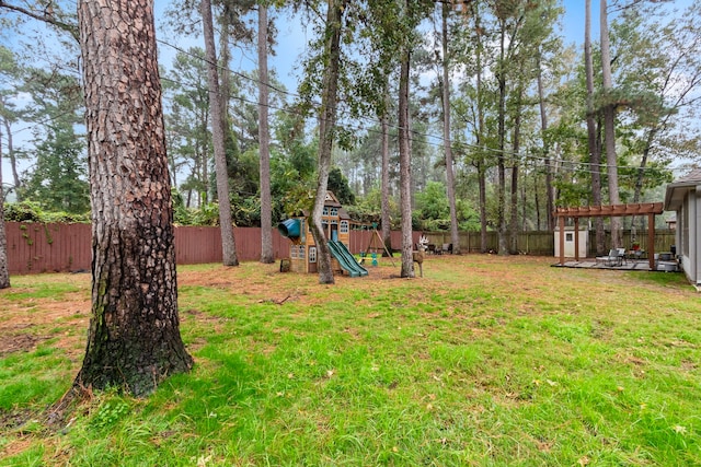 view of yard with a playground