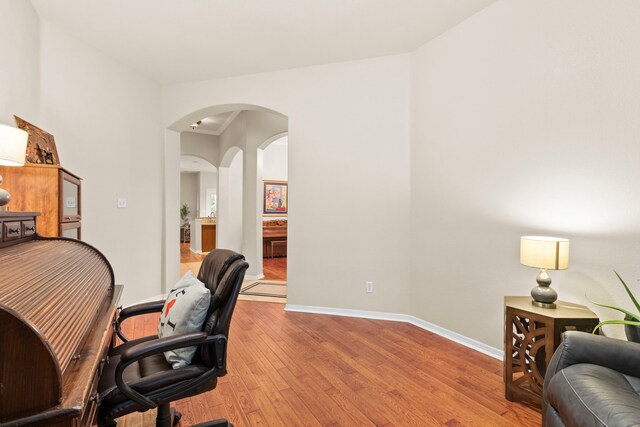 office space with light wood-type flooring