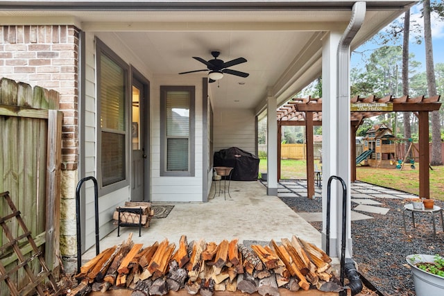 view of patio featuring ceiling fan, a playground, and grilling area