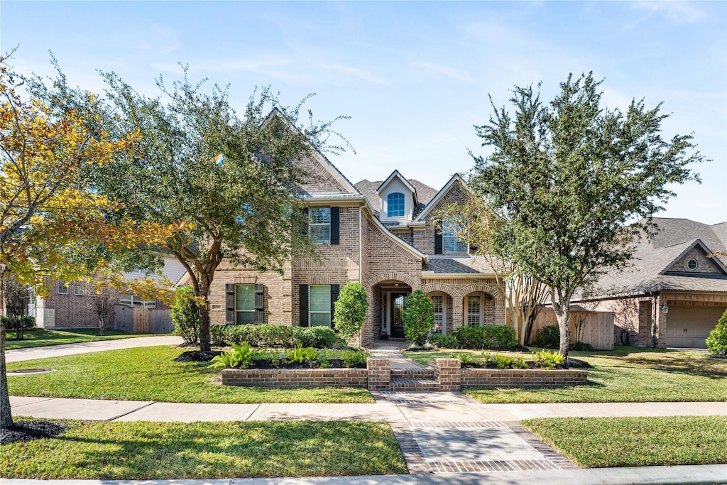 view of front of property with a front lawn