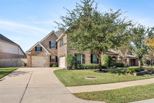 view of front of house featuring a garage and a front yard