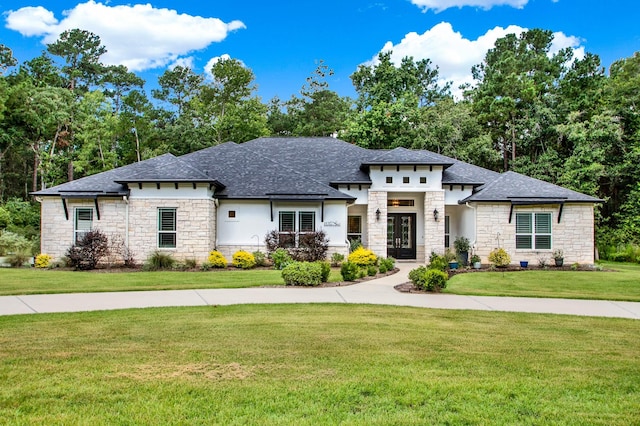 prairie-style home with a front yard