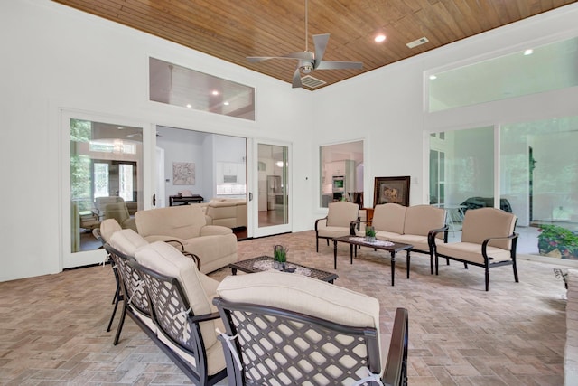 view of patio / terrace featuring ceiling fan and an outdoor living space