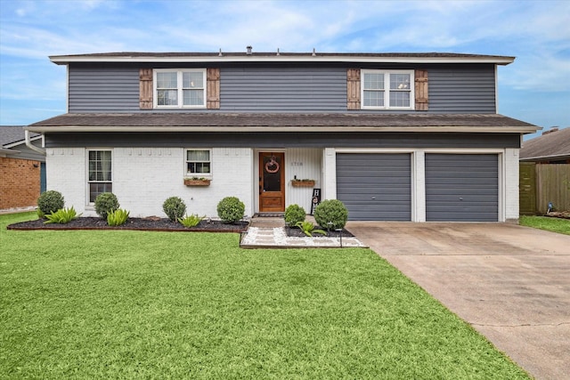 traditional home with an attached garage, driveway, roof with shingles, and a front lawn