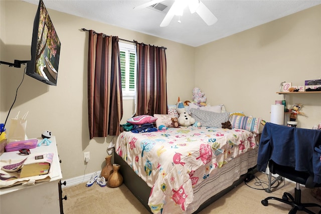 bedroom with ceiling fan and light colored carpet