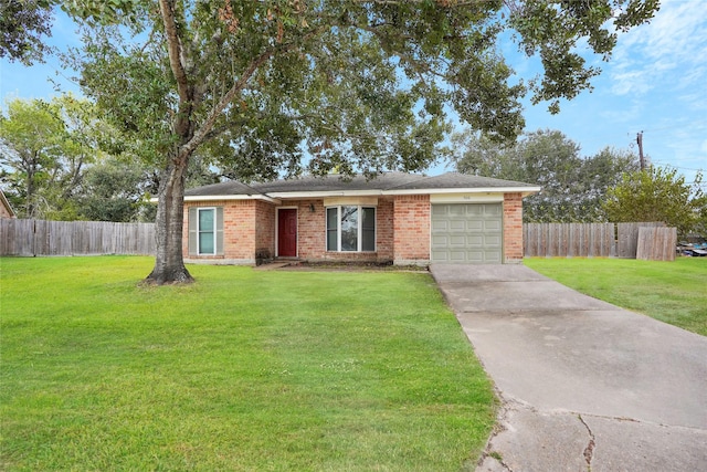 ranch-style house with a garage and a front lawn