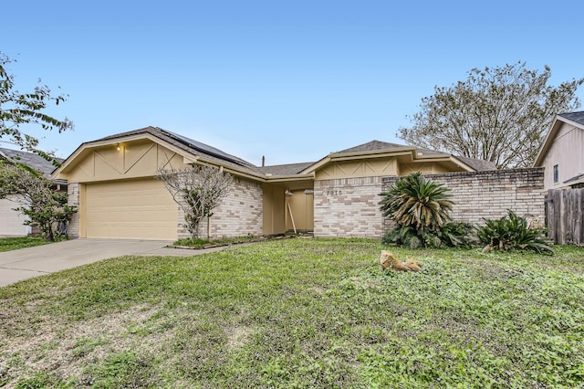 single story home with a garage and a front lawn