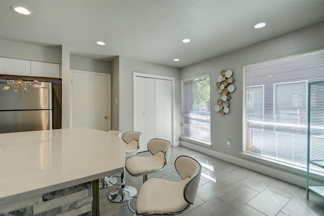 kitchen featuring stainless steel refrigerator