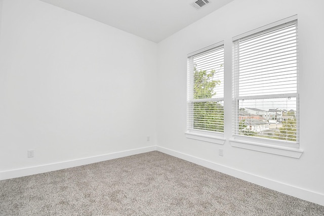 view of carpeted spare room