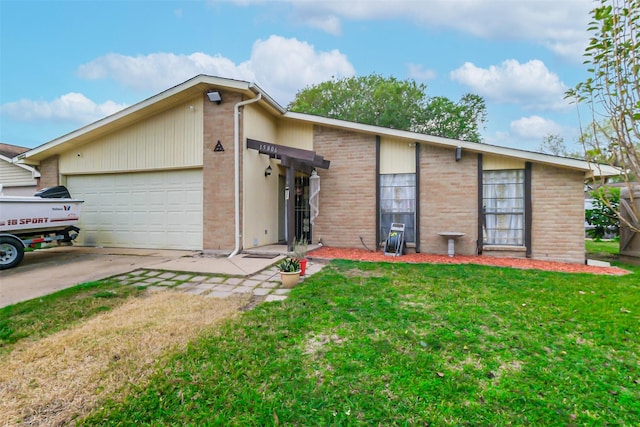 ranch-style home with a garage and a front lawn