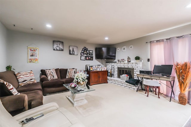 carpeted living room with a fireplace