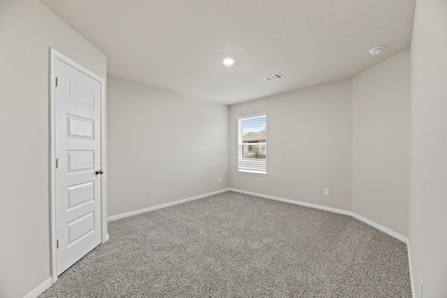 spare room with carpet flooring