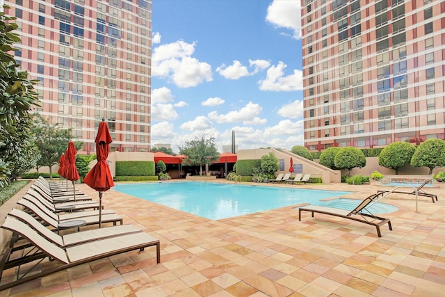 view of swimming pool featuring a patio