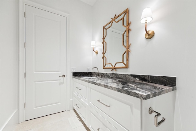 bathroom featuring tile patterned floors and vanity