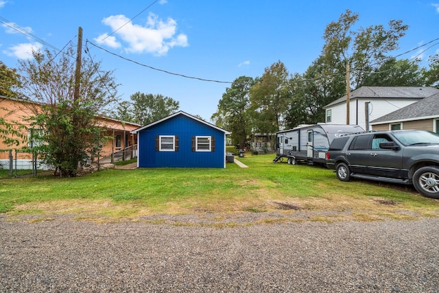 view of property exterior with a lawn