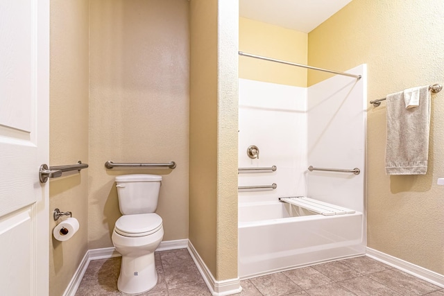 bathroom featuring tile patterned floors, toilet, and shower / bath combination