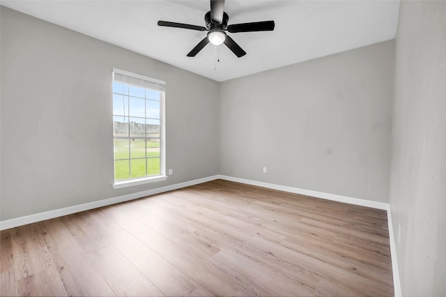 empty room featuring light hardwood / wood-style floors and ceiling fan