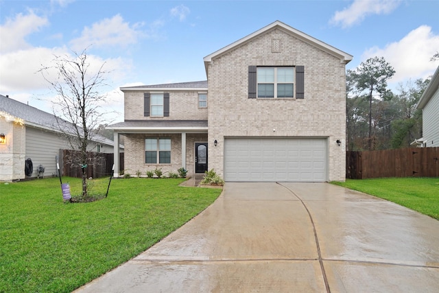 front of property featuring a garage and a front yard