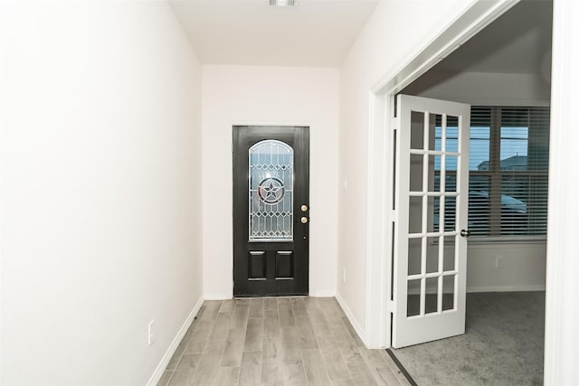 entrance foyer featuring light hardwood / wood-style flooring