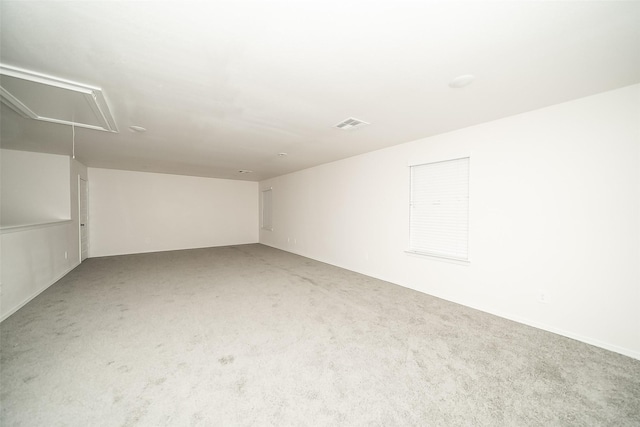 empty room with carpet flooring