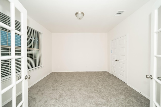 view of carpeted spare room