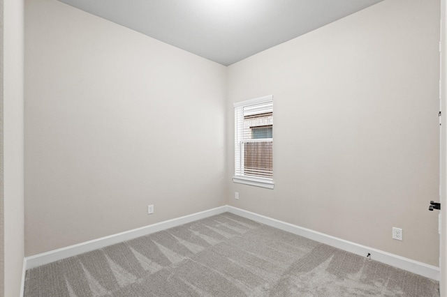 spare room with carpet