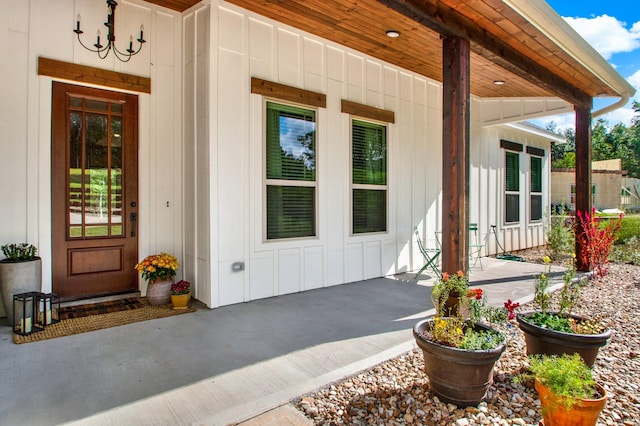 doorway to property with covered porch