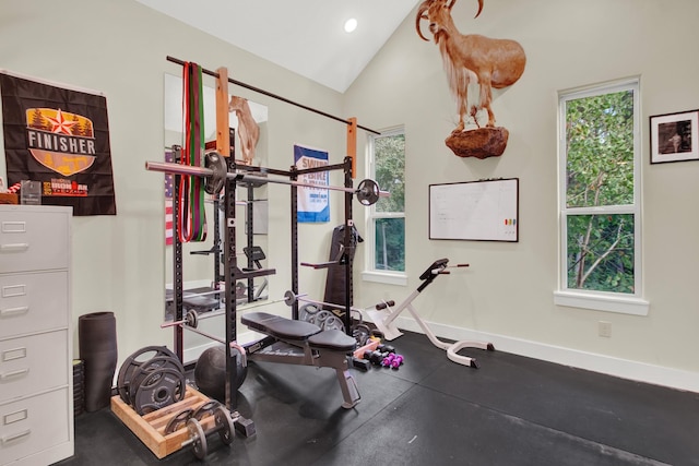 workout area featuring lofted ceiling