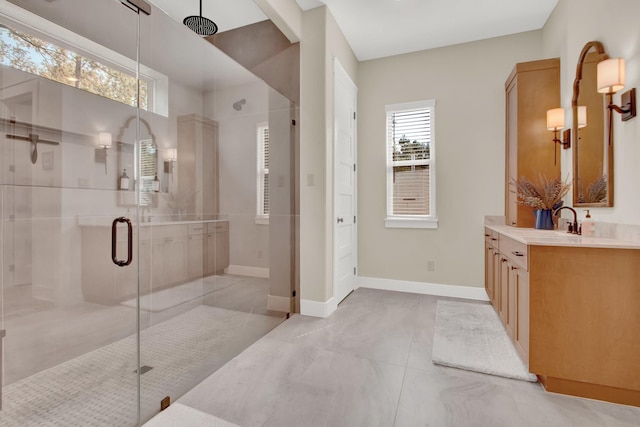 bathroom with vanity and an enclosed shower