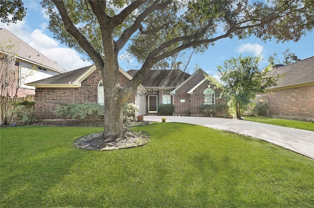 ranch-style house with a front yard