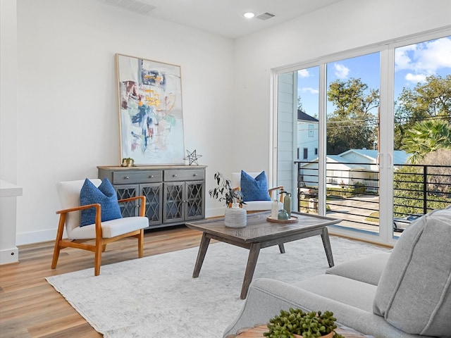 living area featuring hardwood / wood-style floors