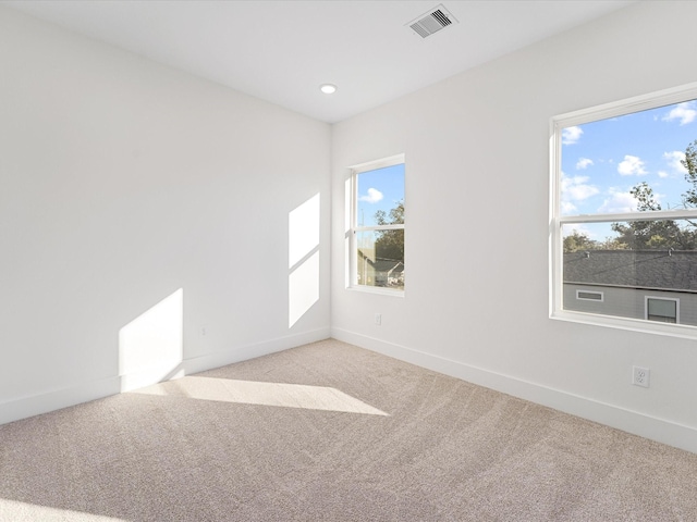 view of carpeted spare room