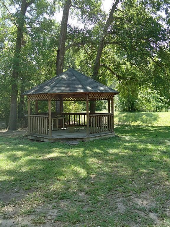 view of community featuring a gazebo and a lawn