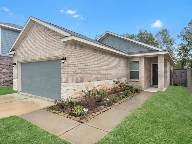 view of front facade featuring a front lawn and a garage