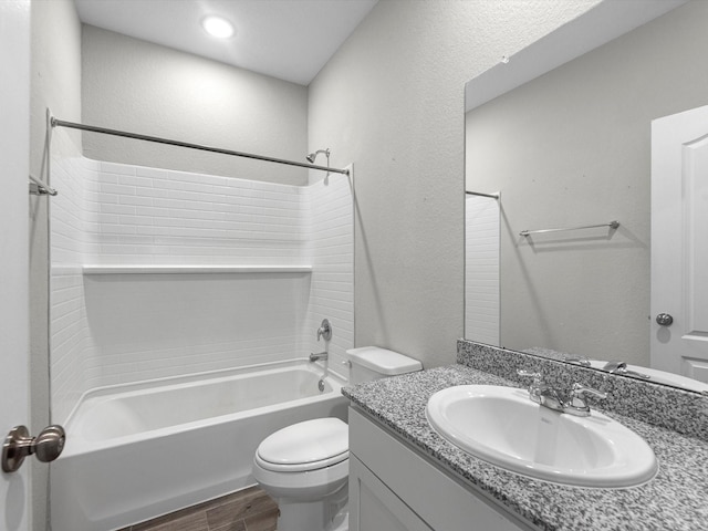 full bathroom with wood-type flooring, vanity, toilet, and shower / bathtub combination