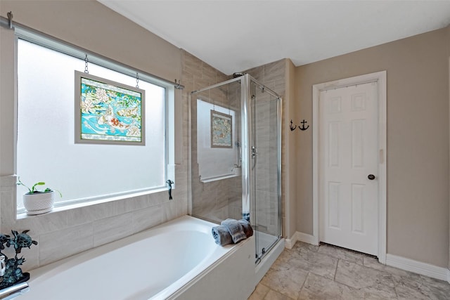 bathroom featuring plus walk in shower