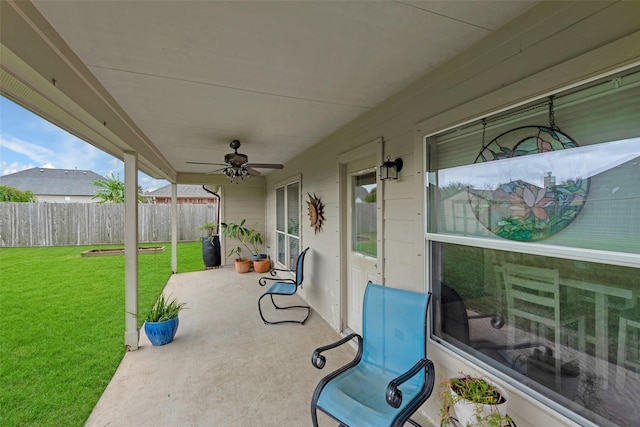 view of patio featuring ceiling fan