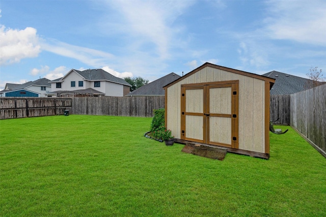 view of outdoor structure with a lawn