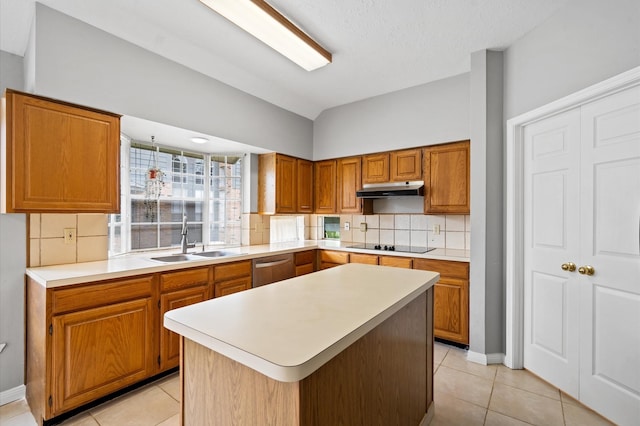 kitchen with sink, a center island, tasteful backsplash, stainless steel dishwasher, and light tile patterned floors