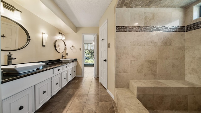 bathroom with tile patterned flooring and vanity