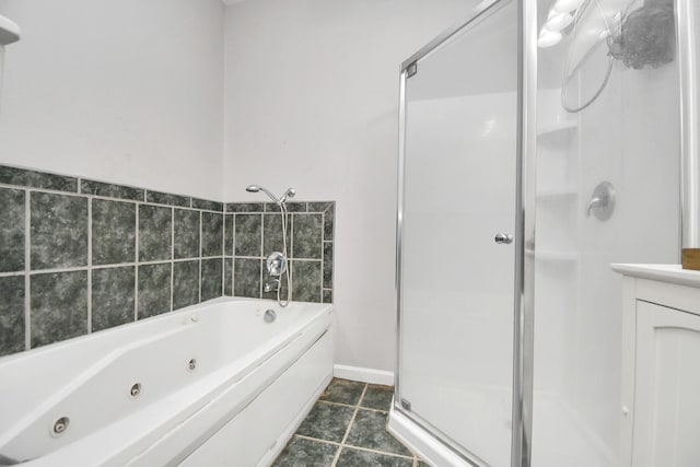 bathroom featuring vanity and plus walk in shower