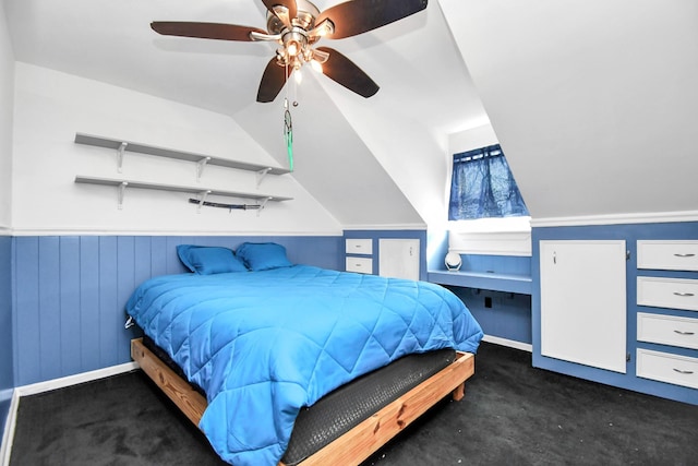 bedroom featuring ceiling fan and lofted ceiling