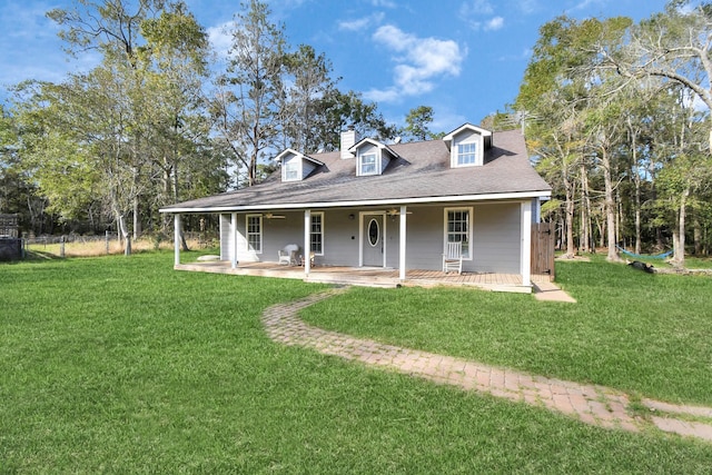 view of front of property featuring a front lawn and covered porch