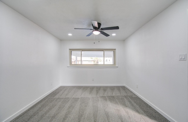 unfurnished room featuring carpet flooring and ceiling fan