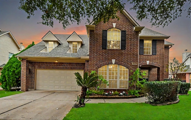 front of property featuring a garage