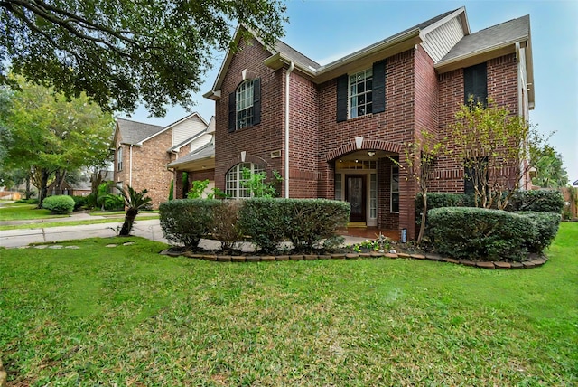 view of front of house with a front lawn