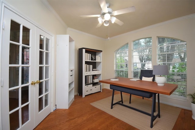 home office with crown molding, french doors, ceiling fan, and wood-type flooring