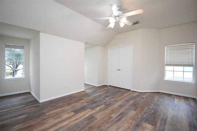 spare room with ceiling fan and dark wood-type flooring