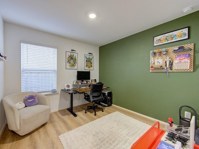 office area with hardwood / wood-style floors