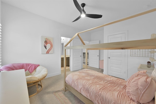 bedroom with ceiling fan and carpet